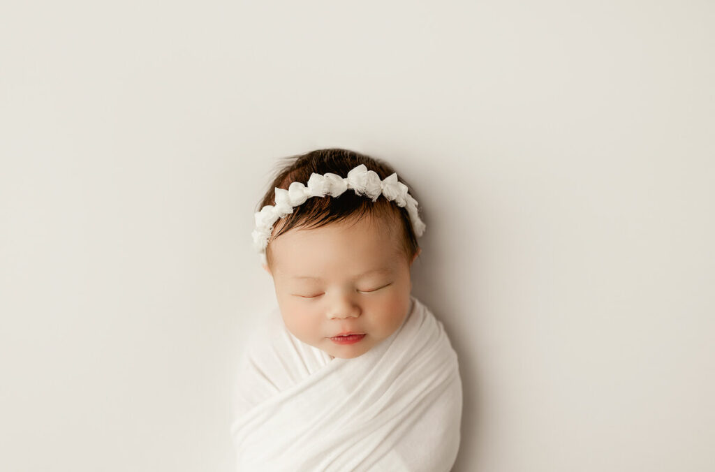Wrapped Newborn Baby Girl Photo